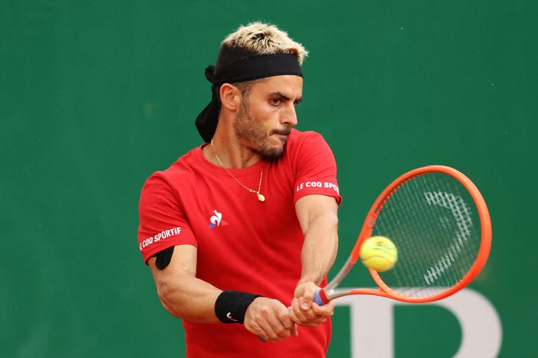 Thomas Fabbiano colpisce di rovescio (foto Getty Images)