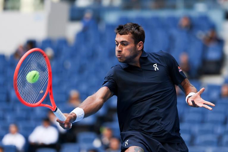 Flavio Cobolli in azione a Pechino (Getty Images)