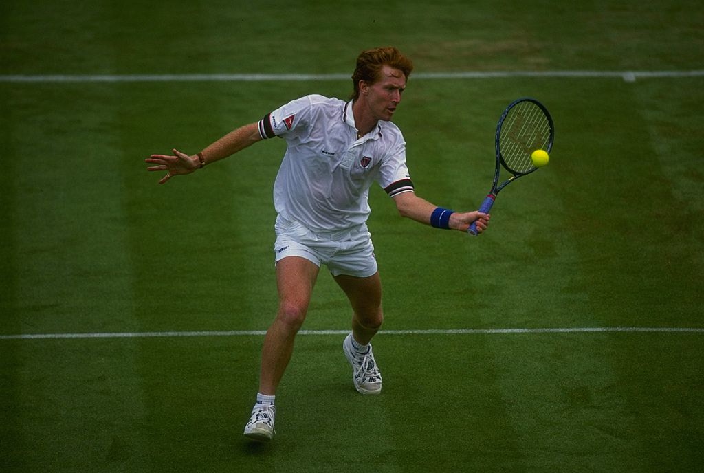 Mark Woodforde in azione sull'erba di Wimbledon